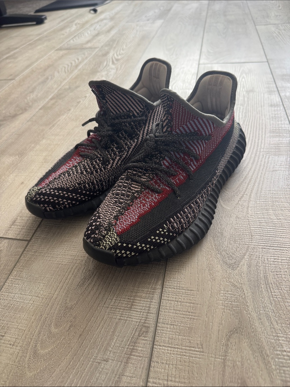 Yeezy Boost Athletic Sneakers in Black and Red Knit